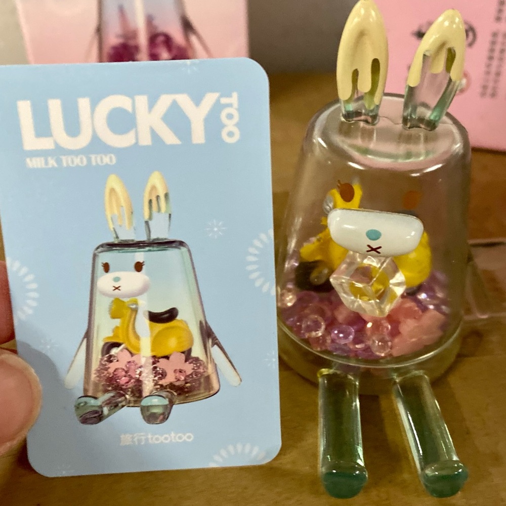 Designer Toy - “Lucky Too” - cell phone holder with scooter bead inside
